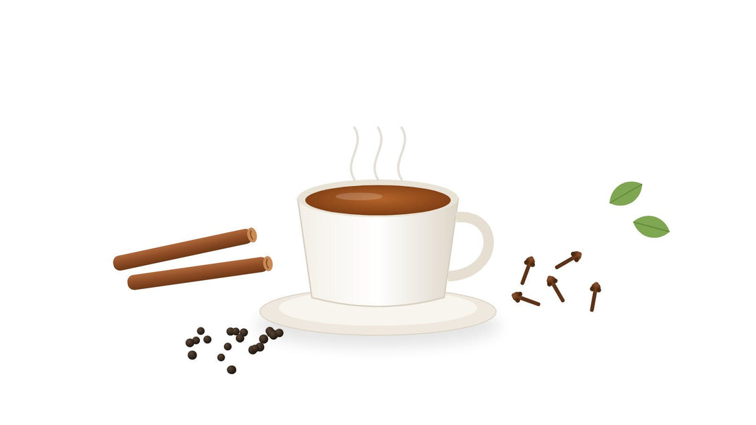 Cup of kashaya decoction with cinnamon, cloves, black pepper and tulsi